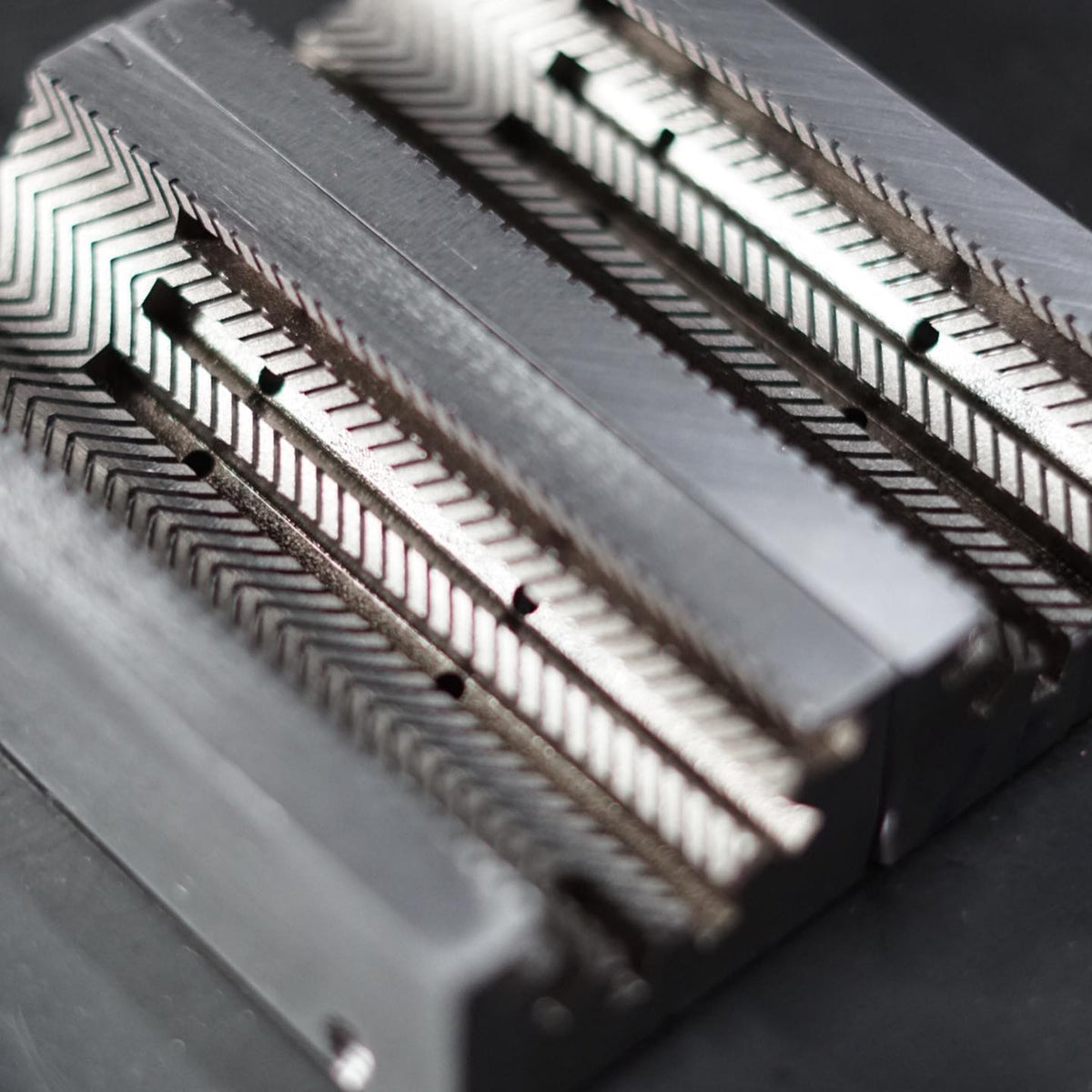 Finished steel mold showing the Icon Grip tread details in reverse