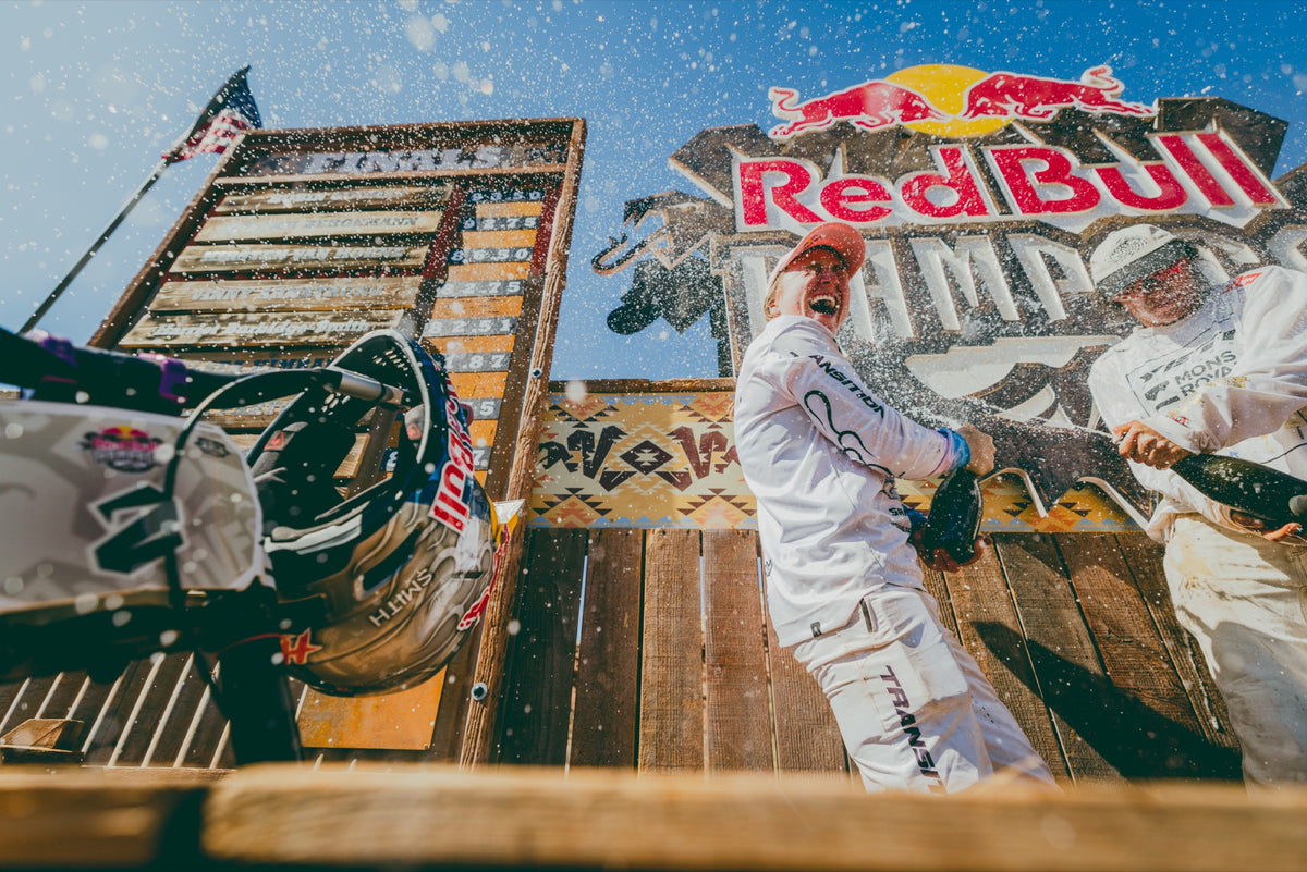 Champagne spray on the podium. Photo: Robin O'Neill.