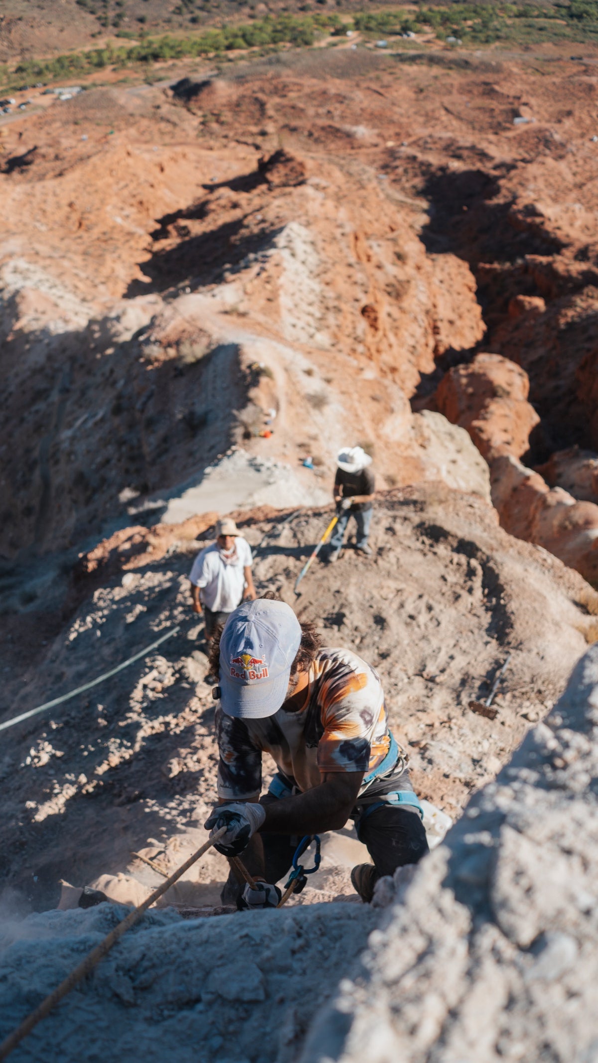 Johny's crew digs into a steep slope.